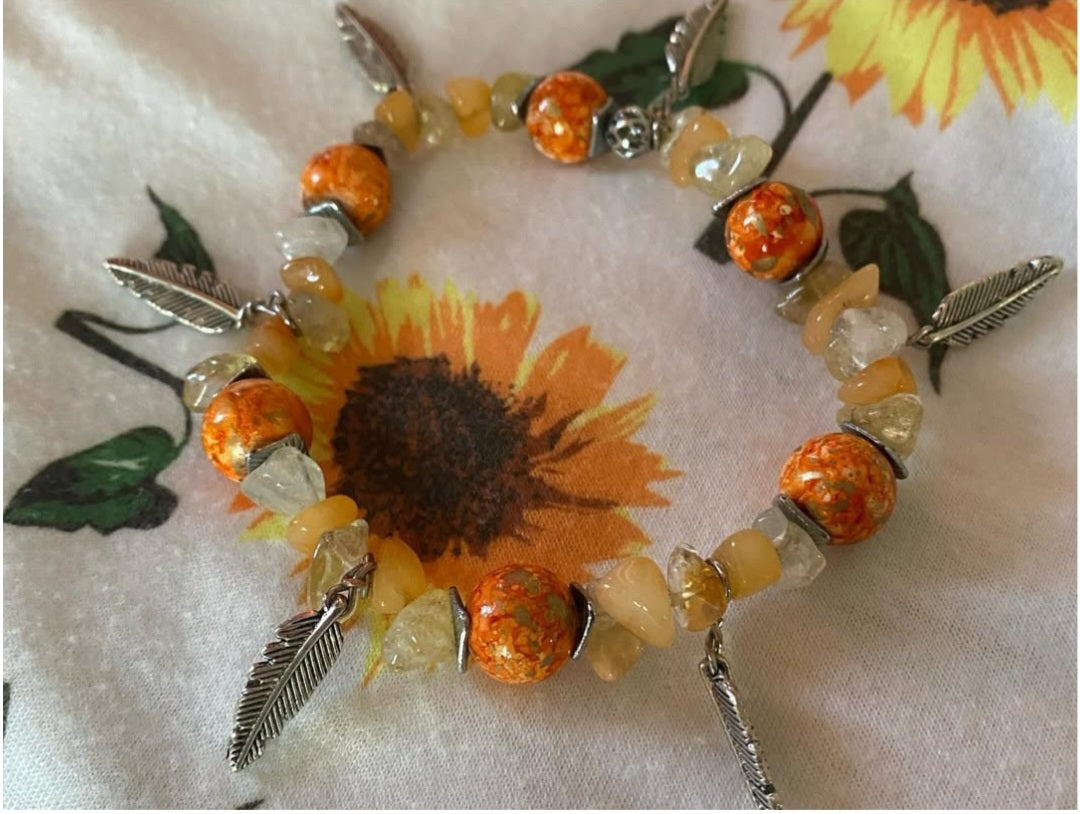 Natural dyed orange quartz, Natural Amber with orange swirl ceramic beads and antique silver leafs